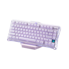 GravaStar Mercury K1 transparent mechanical keyboard featuring white keycaps and a custom Lavender Purple frame finish.