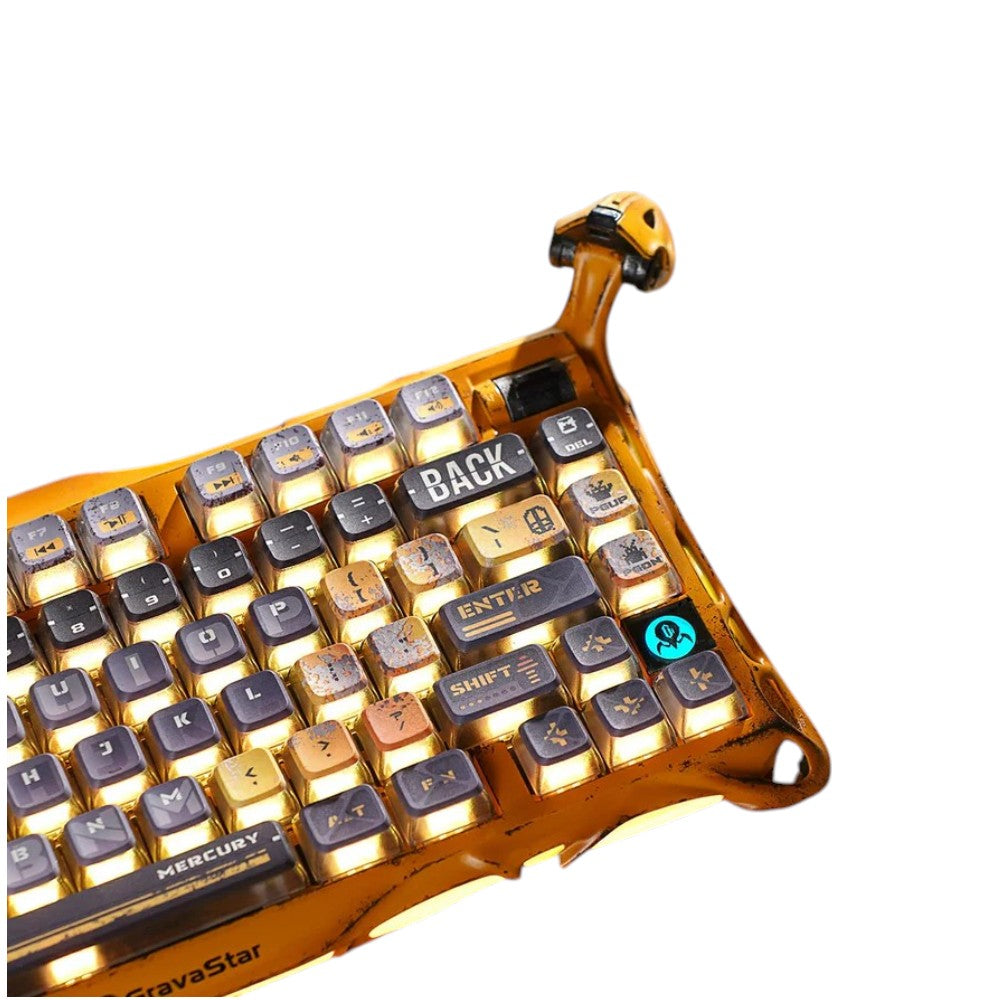 GravaStar Mercury K1 Pro Special Edition mechanical keyboard with a battle-worn yellow and gold geometric frame.